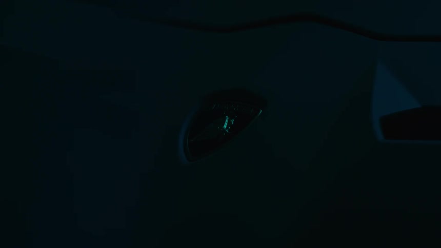Closeup of the lamborghini logo on the front of the vehicle