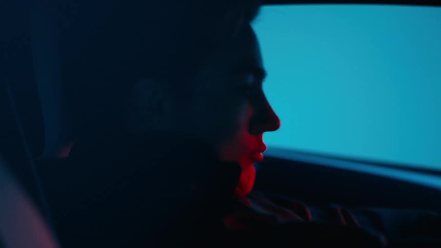 A man jerks on the steering wheel