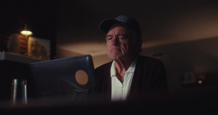 A man sits in a living room