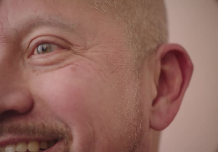Portrait of a smiling man talking