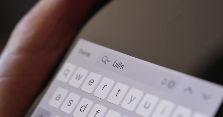 A person texts on their phone