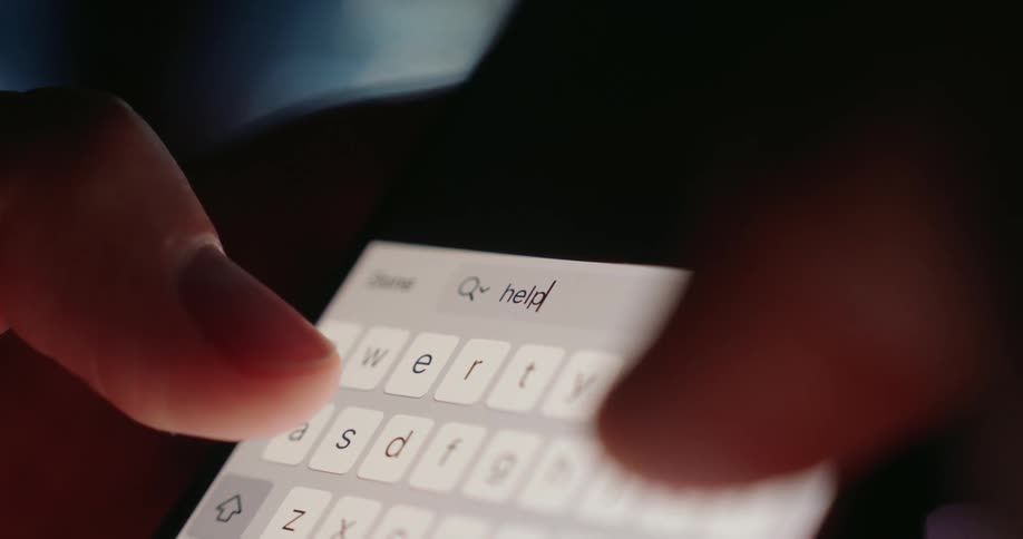 A person texts on their phone
