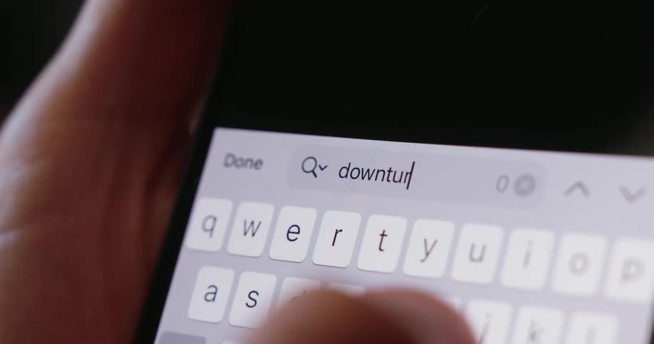 The word downturn is searched on the cell phone