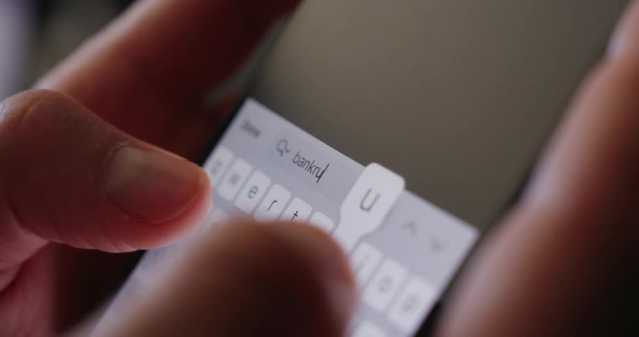 A person is searching the word bankruptcy on their phone