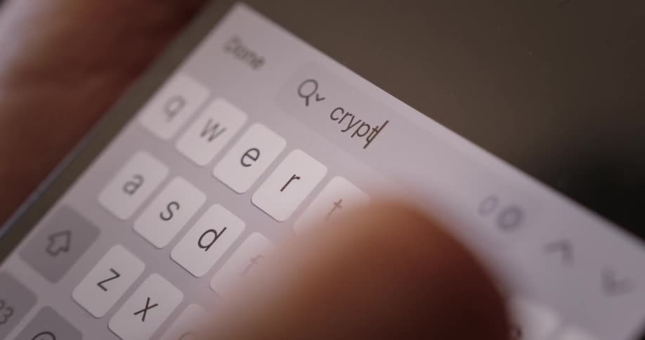 A person is searching the word crypto on their device