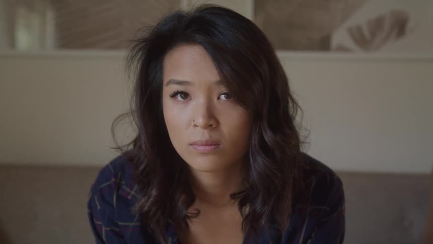Portrait of a young woman with black hair