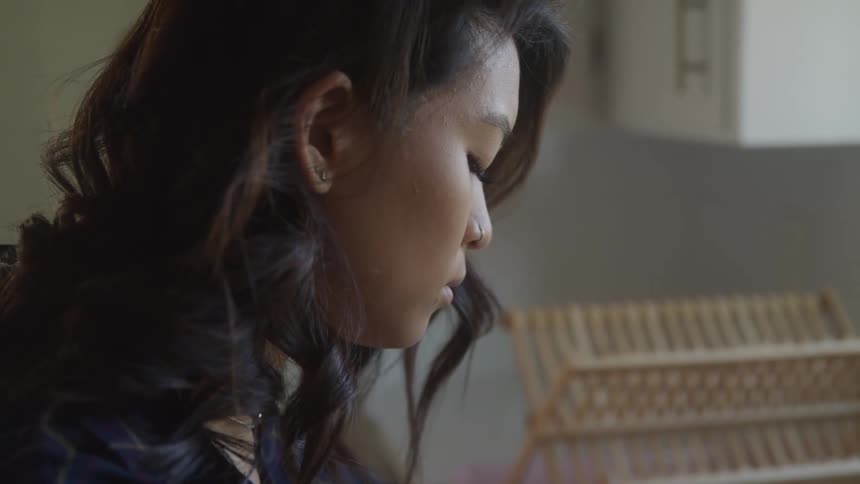 Side portrait of a thoughtful young woman