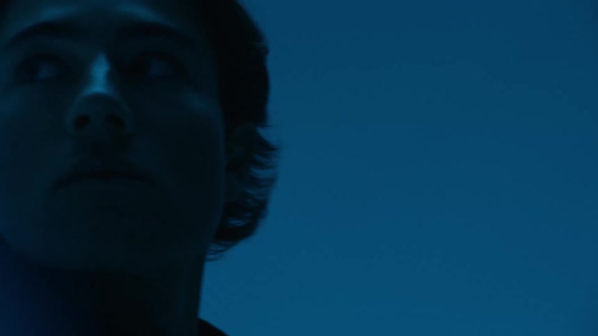 Portrait of a man in a lowlight indoor environment