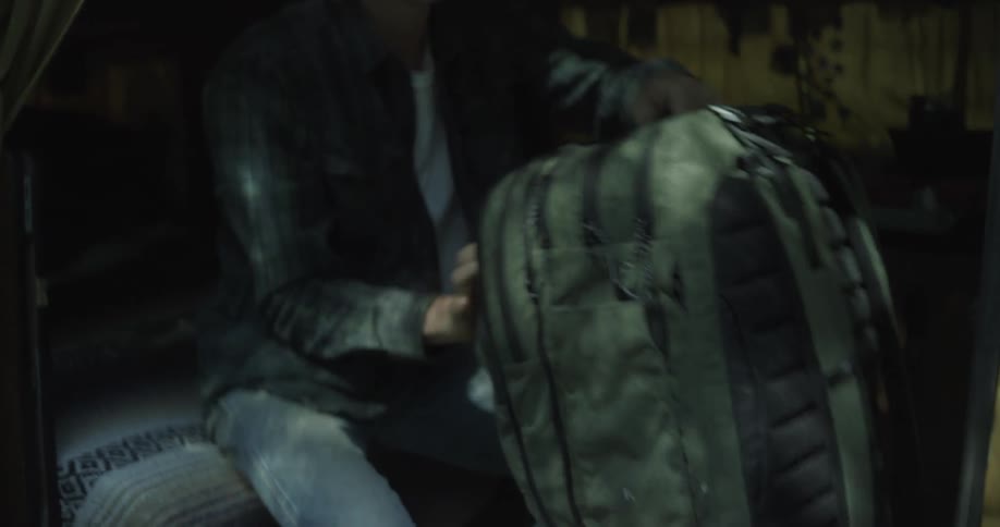 A man packs his bag then goes hiking