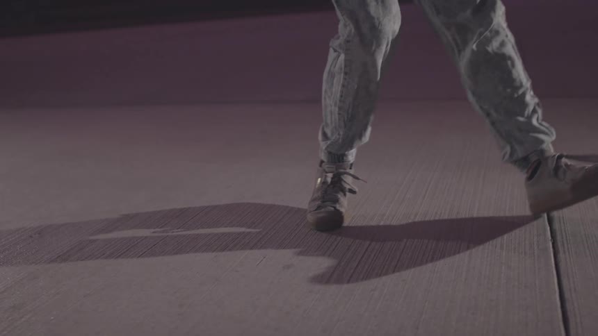 A man dances using fancy footwork