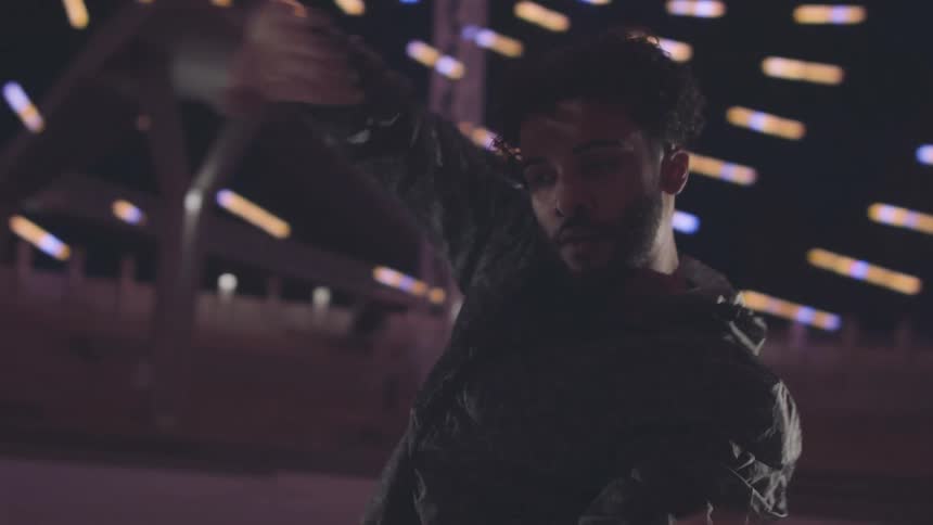 A man dances for the camera