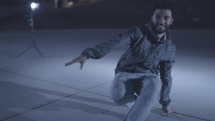 A man breakdances