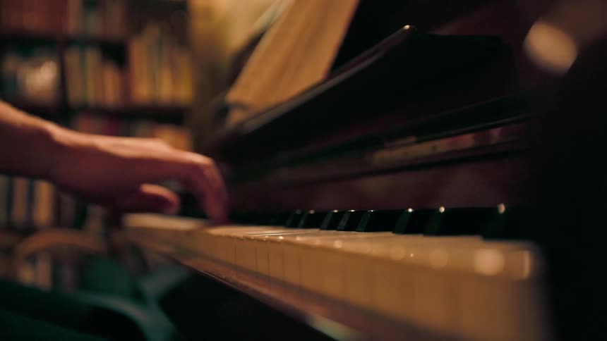 A person plays piano