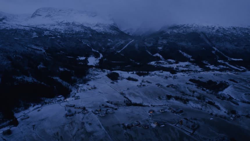 A mountain range is shown in the distance