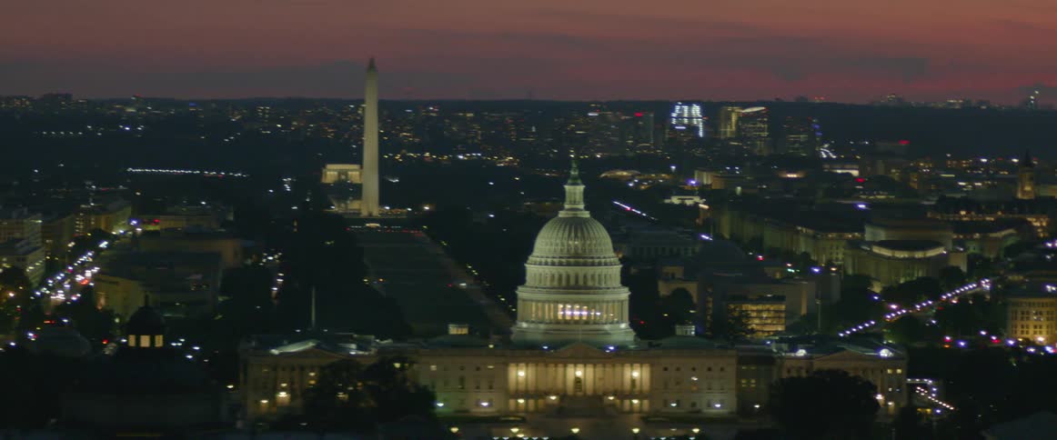 A brightly lit city at sunrise