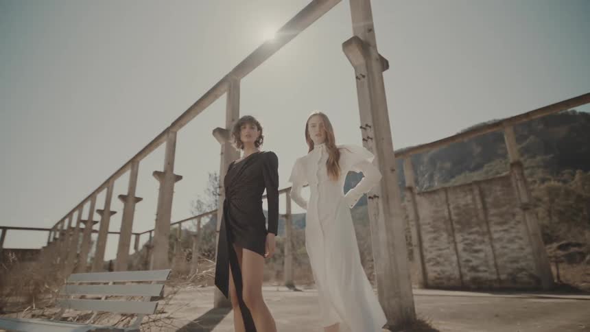 Two women posing in a photoshoot