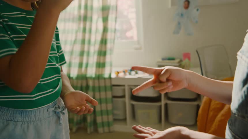 Two children playing in a room