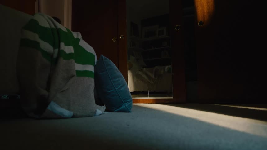 A boy and girl are playing hide and seek in the house