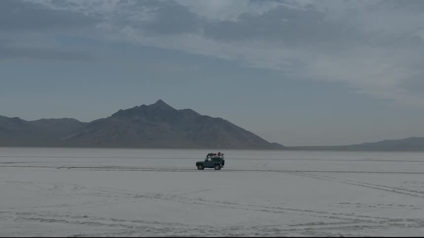 The vehicle travels down the road
