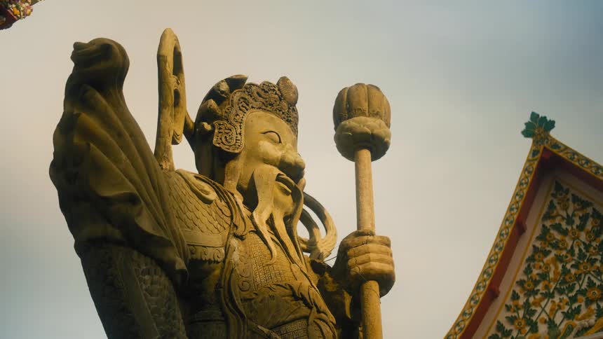 Outdoor asian stone statue