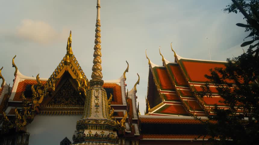 The temple has gold trim on the roof
