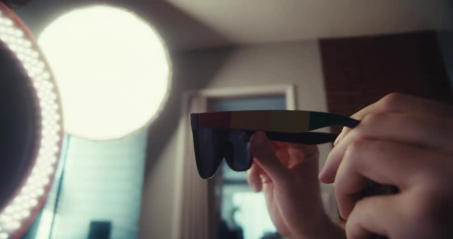 Side portrait of a man wearing sunglasses
