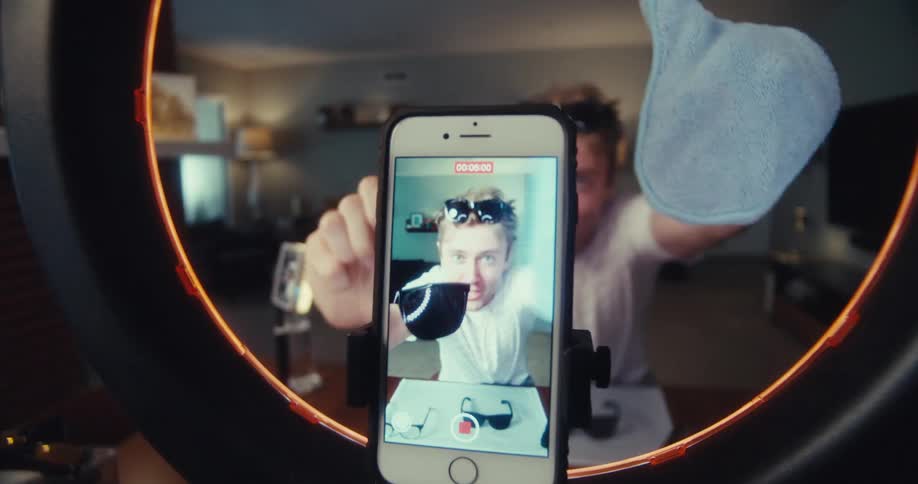 A footage of a man making a video