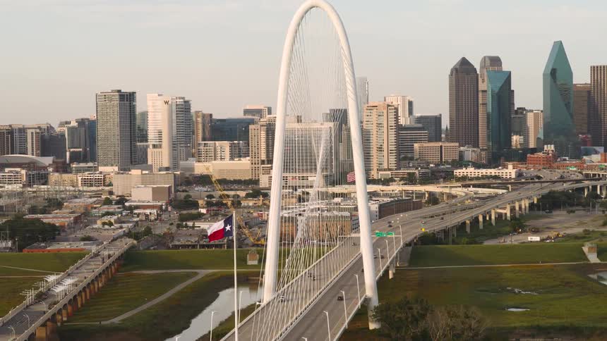 Traffic is moving on the large arch bridge