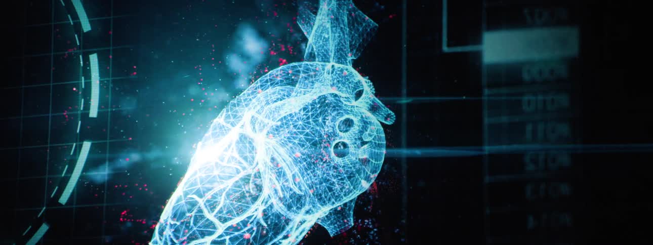 A rotating glowing wireframe model of a human heart displayed against a dark background with digital grid lines and text