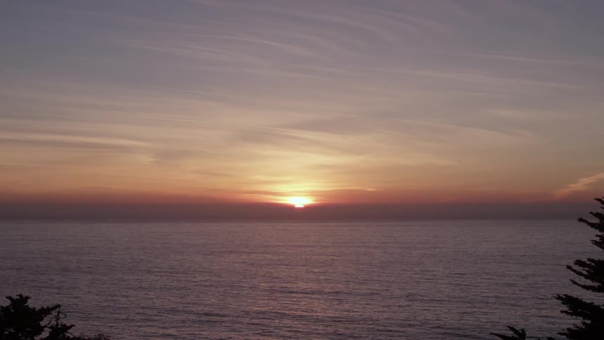 The sunsets over the water