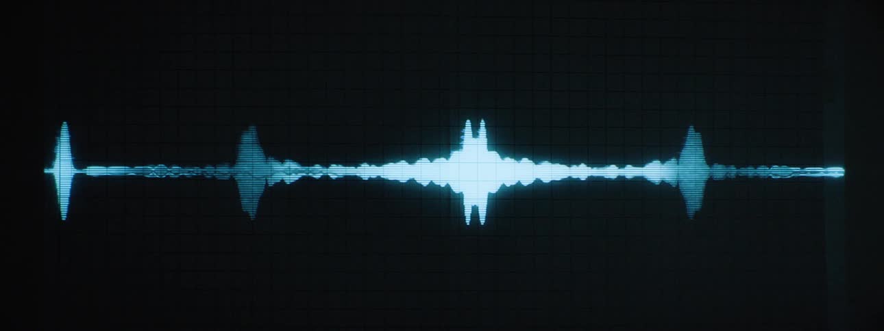 A sound wave monitor screen displaying a radarstyle visualization of sound waves in a blue format