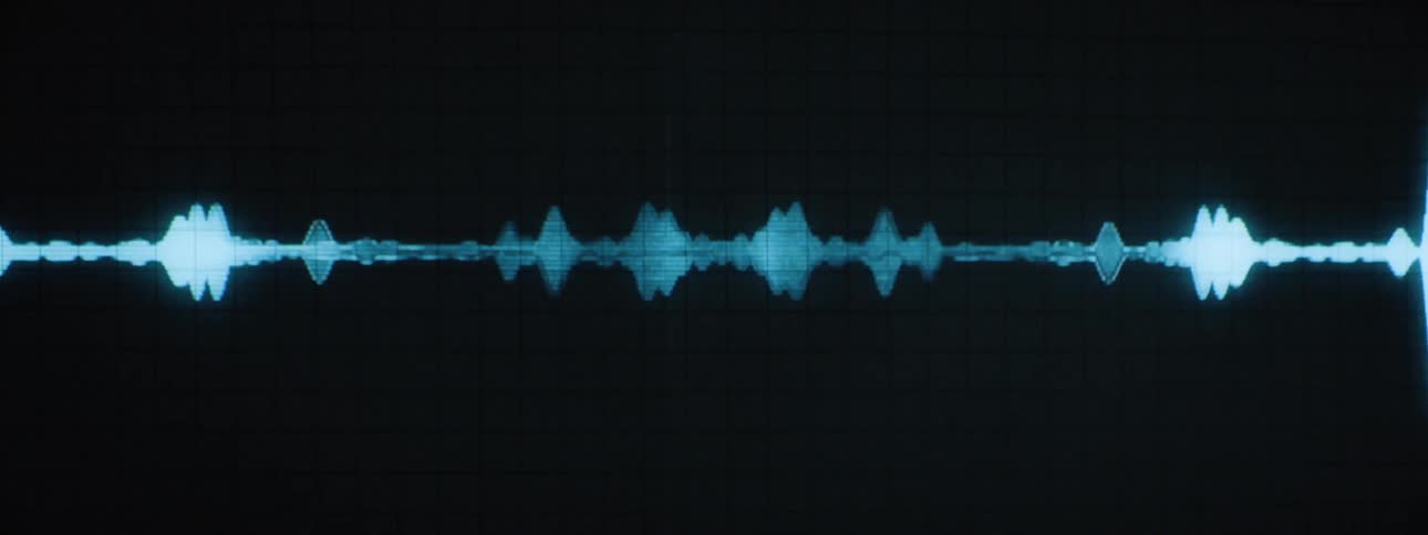 Different frequencies and amplitudes of sound waves shown on a display