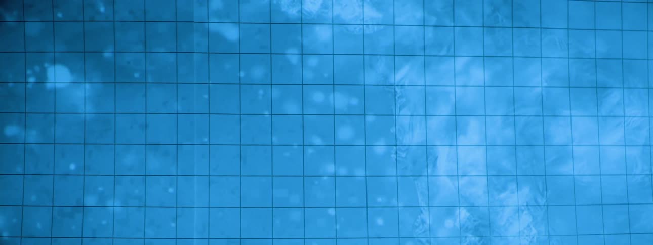 The image of a woman separates into pixels on a screen