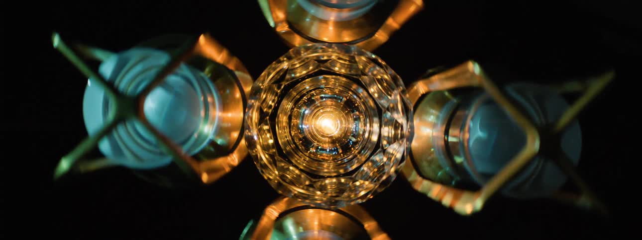 Light shines from the center bulb of a multi bulb light fixture