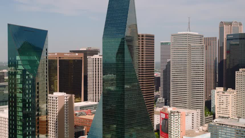 Aerial view of a modern city skyline with tall skyscrapers