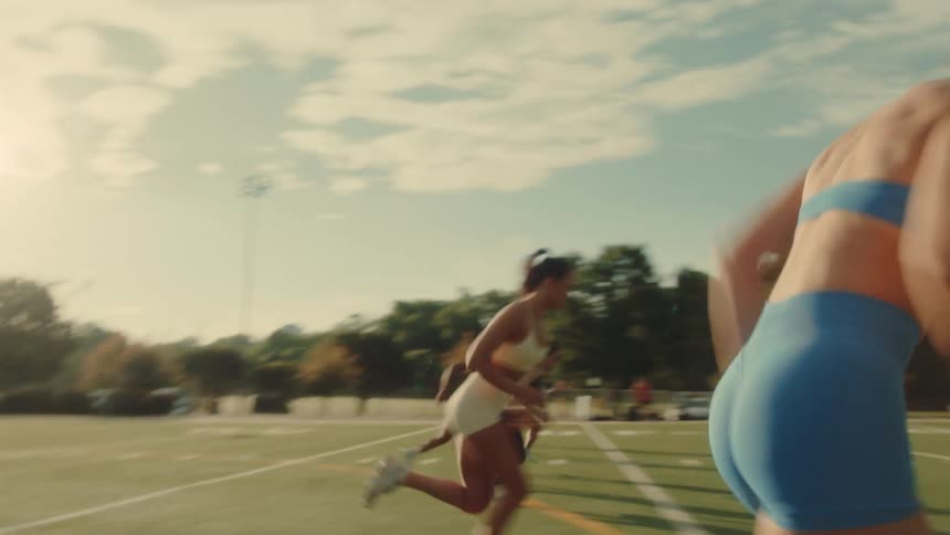 Women race on the football field