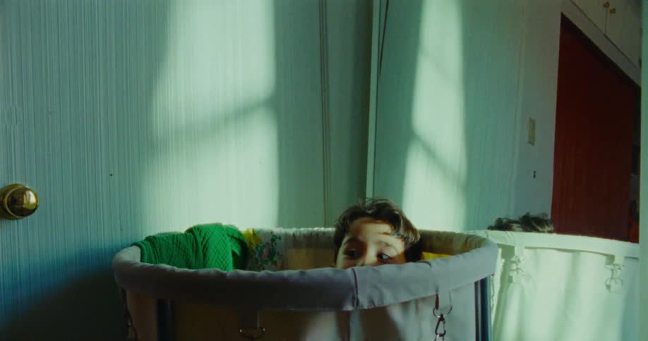 A boy playing hide and seek