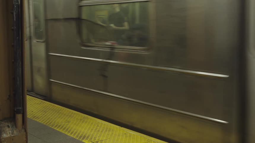 Train stopping at a subway station