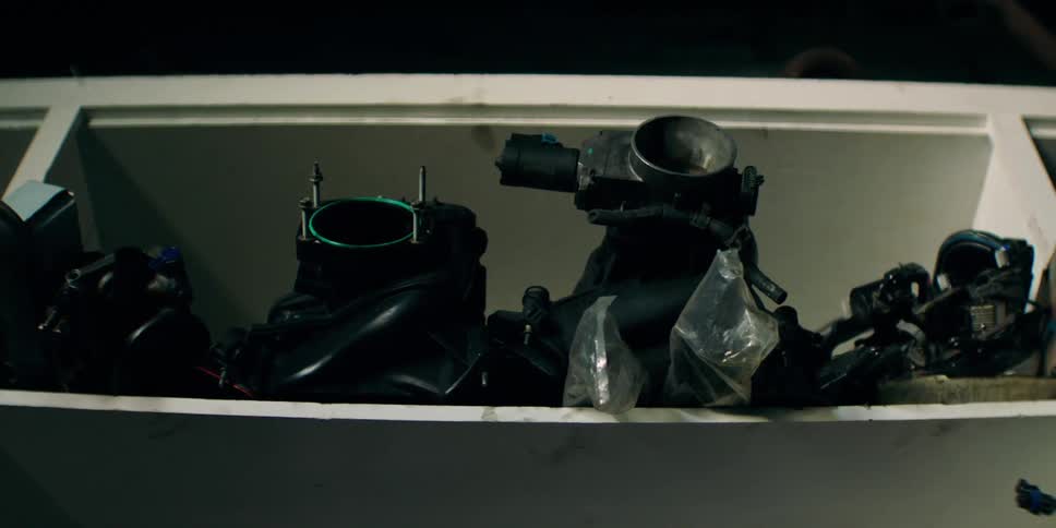 The shelf is full of cameras