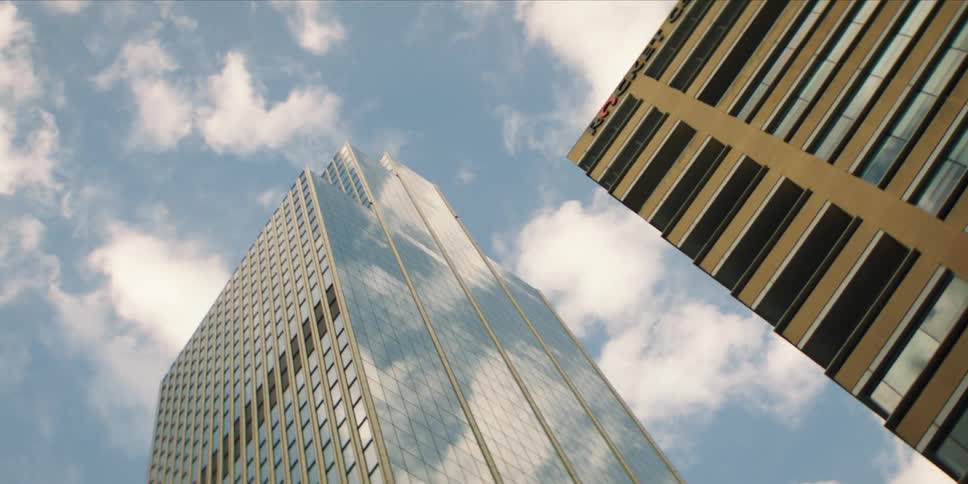 A city filled with a series of skyscrapers and highrise buildings at midday