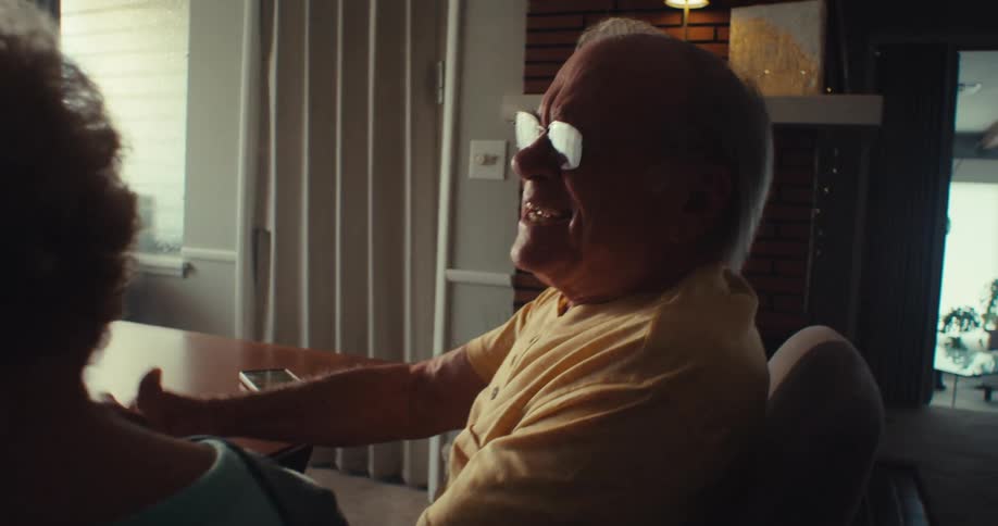 A man cheers at the tablet