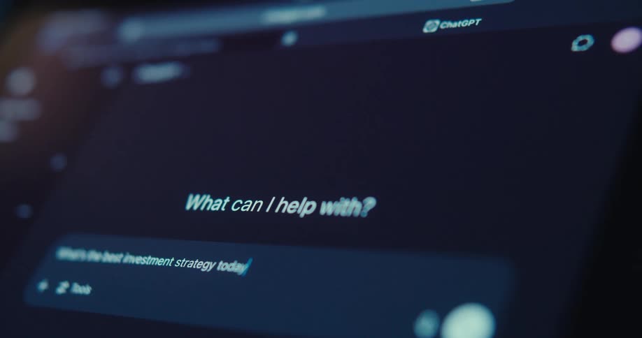 A computer screen displaying the phrase what can i help you with as new words are being typed beneath it