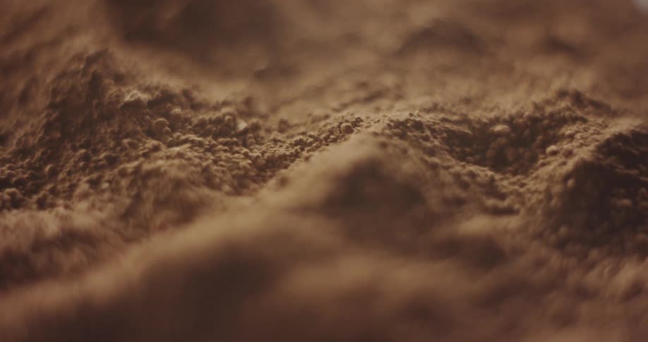 Hills form in a brown powder