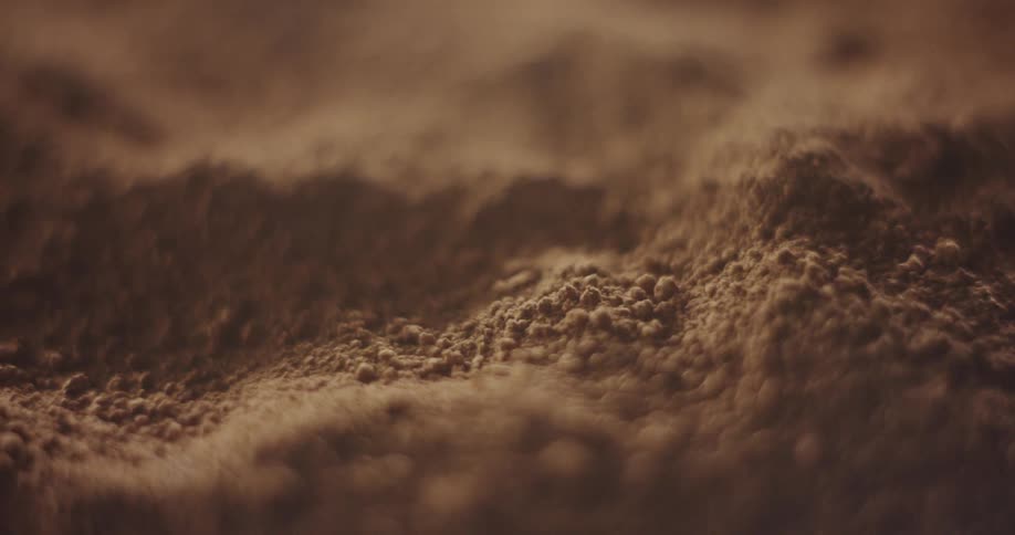 Hills form in a brown powder
