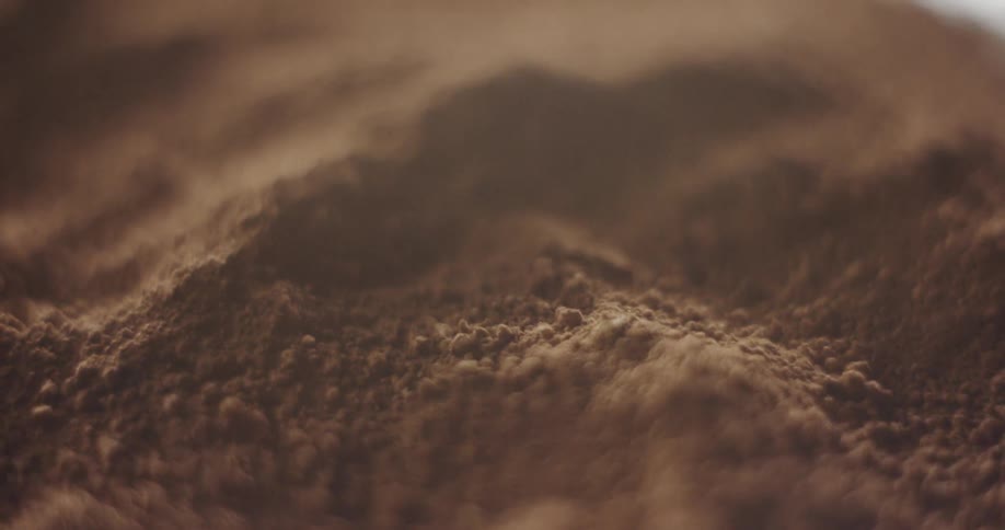 Hills form in a brown powder