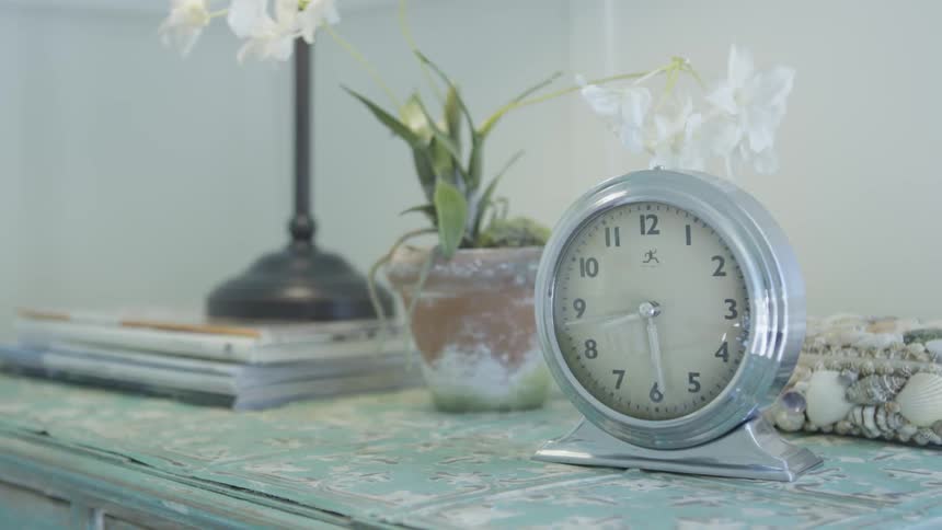 A clock sits on a table