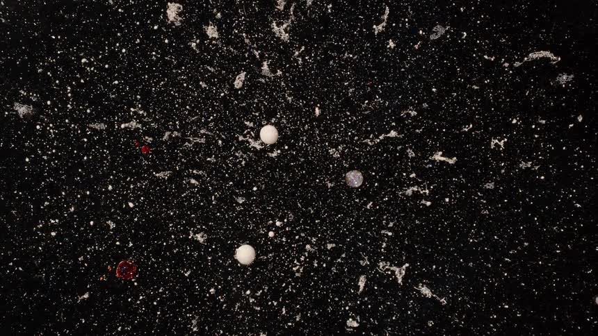 A computer generated animated screen of the galaxy showing a multitude of tiny stars