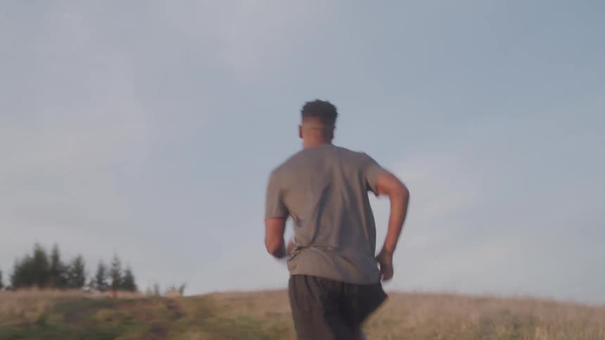 A man runs outside