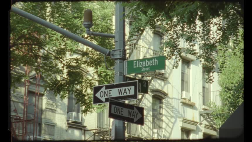 Road signs are in front of the building
