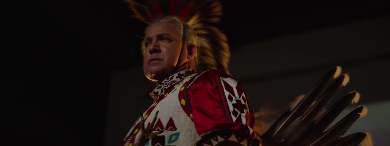 Man wearing traditional indigenous clothing